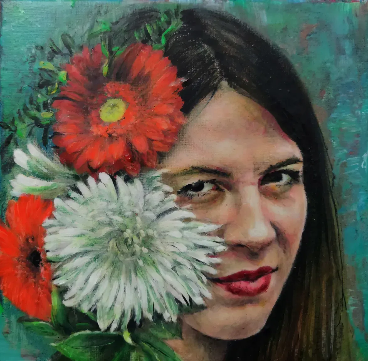 Un cuadro de una mujer con flores en el pelo.