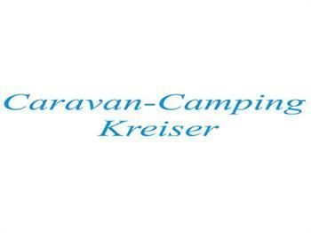 Das Logo von Caravan-Camping Kreiser ist blau und weiß.