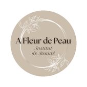 Logo for A Fleur de Peau Institut de Beauté: beige circle with white floral line art and dark brown serif text.