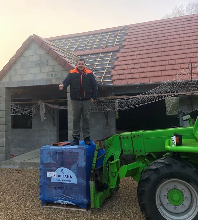 Toit en cours de remplacement de couverture