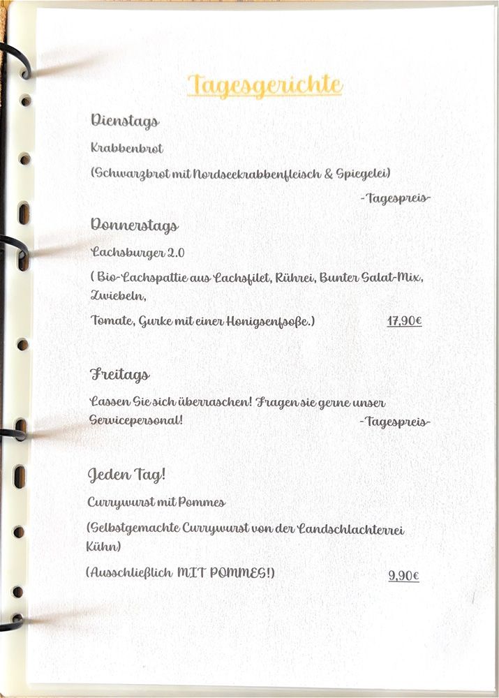 Handgeschriebenes Tagesordnungsblatt mit gelber Überschrift und mehreren in schwarzer Tinte geschriebenen Tagesordnungspunkten.