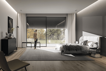 Ein Schlafzimmer mit Bett, Sessel, Kommode und Glasschiebetüren.