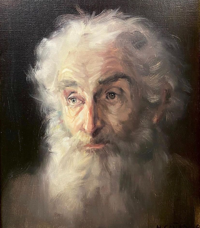 Retrato de un hombre mayor, con larga barba y cabello blancos, mirando ligeramente hacia un lado.