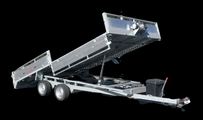 Un remolque volquete con su lado hacia arriba sobre un fondo negro.