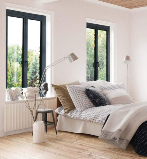 Deux fenêtres en alu dans une chambre