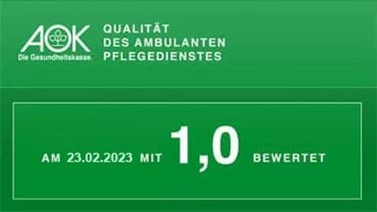 A green sign that says aok quality des ambulanten pflegedienstes