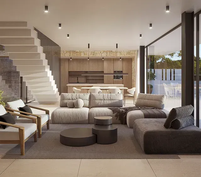 Una sala de estar con muchos muebles y una escalera.