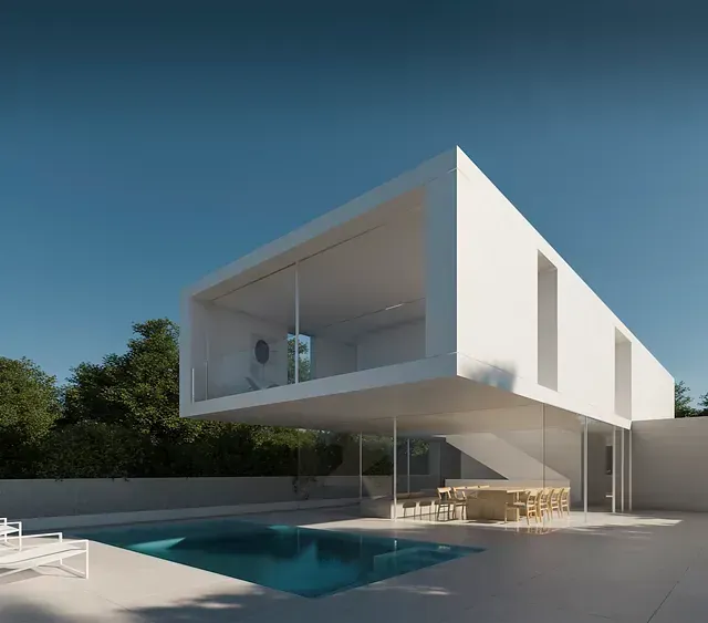 Una gran casa blanca con una piscina delante de ella.