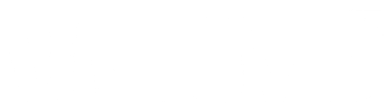 Primer plano de un tejido o alfombra vibrante, multicolor y con un estampado circular, con intrincados detalles geométricos.