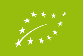 Ein grüner Hintergrund mit weißen Sternen darauf