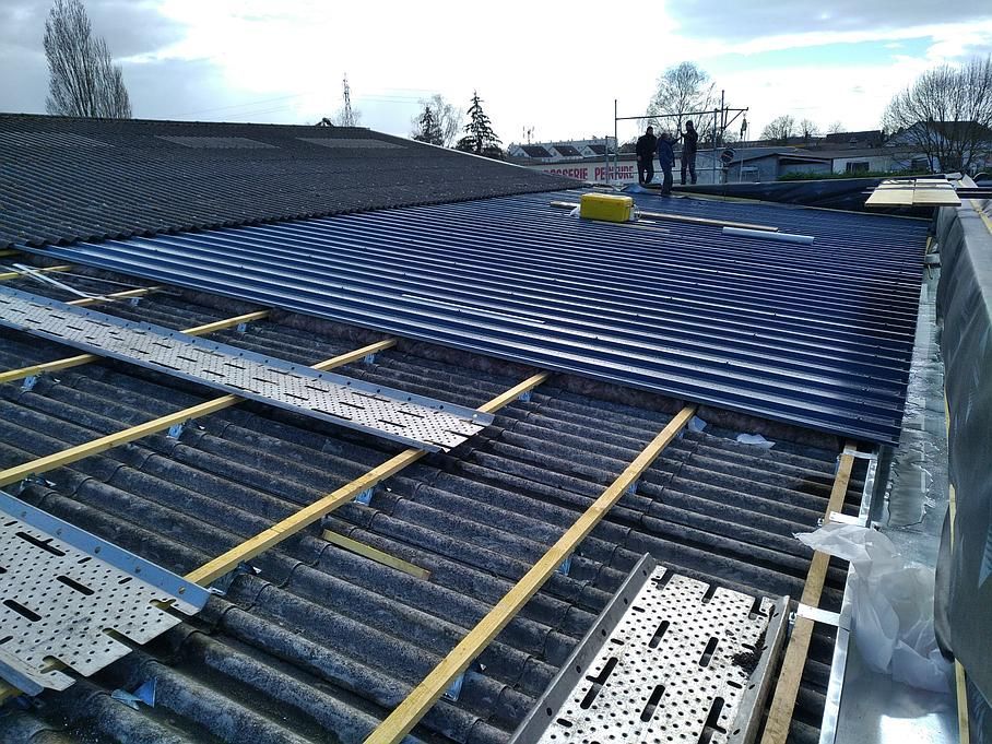 Pose d'une toiture de fibrociment