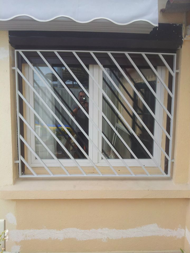 Pose de grille de défense