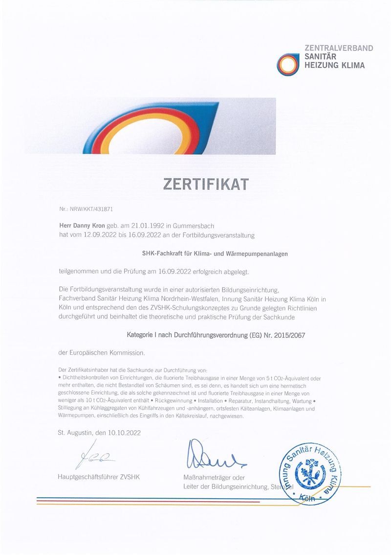 Ein deutschsprachiges Zertifikat der Helios Klinik mit deren Logo und zwei Unterschriften sowie einem runden Siegel.