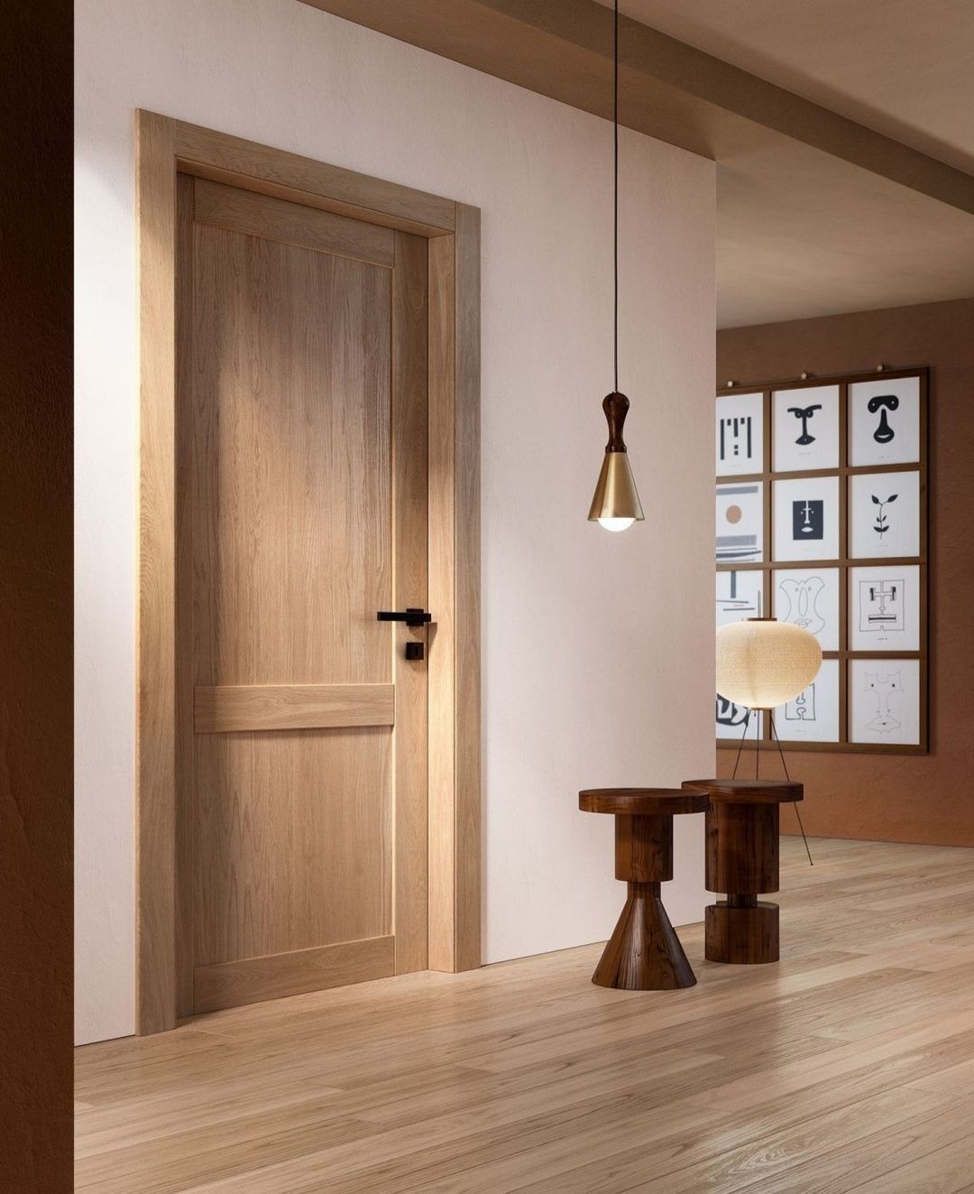 Porte intérieure en bois dans un couloir aux tons neutres, avec suspension lumineuse, tabourets en bois.
