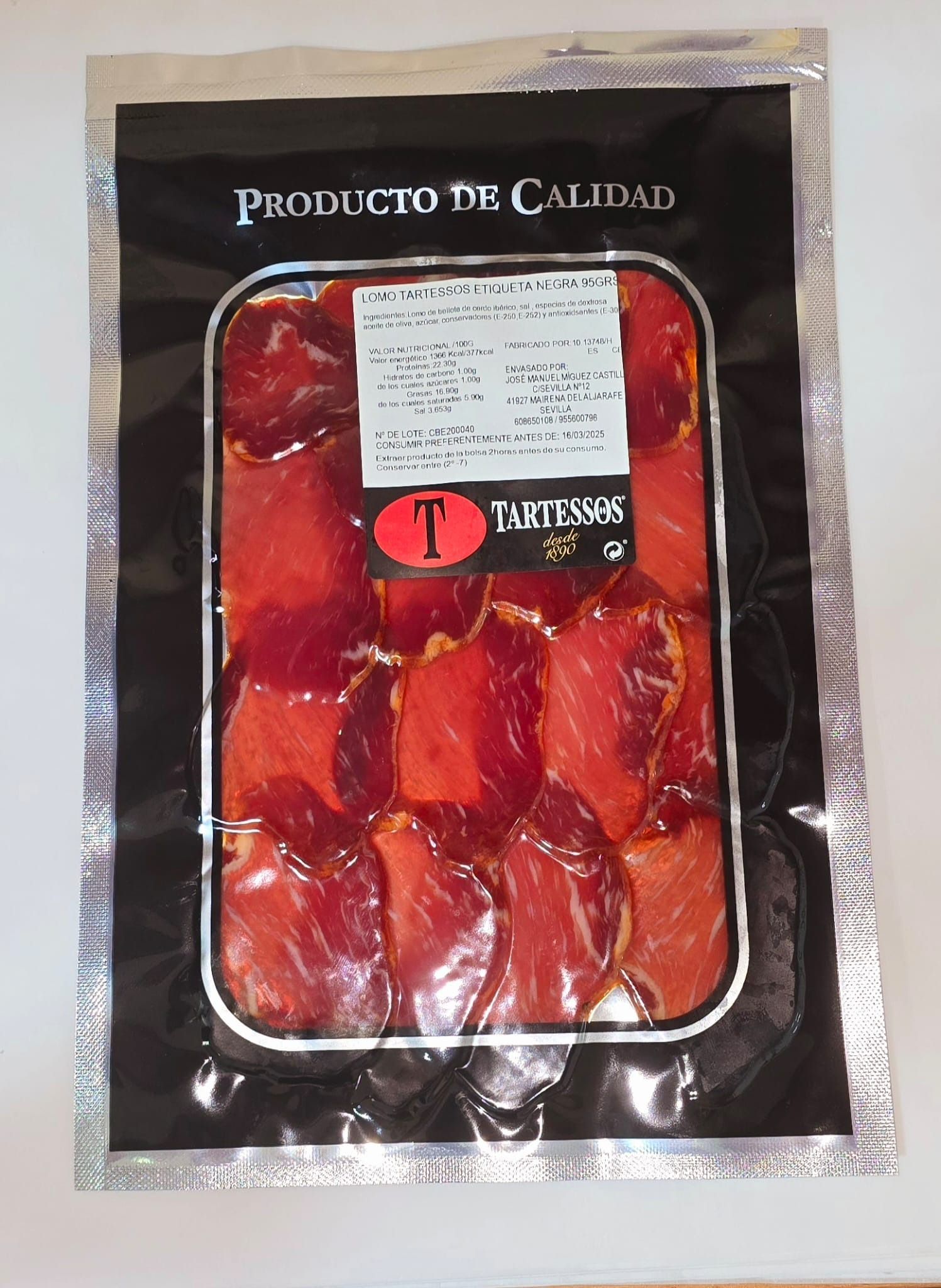 A package of sliced meat says producto de calidad