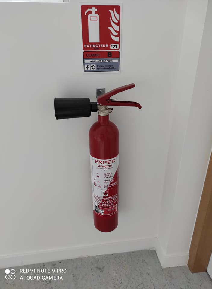 Pose d'extincteur