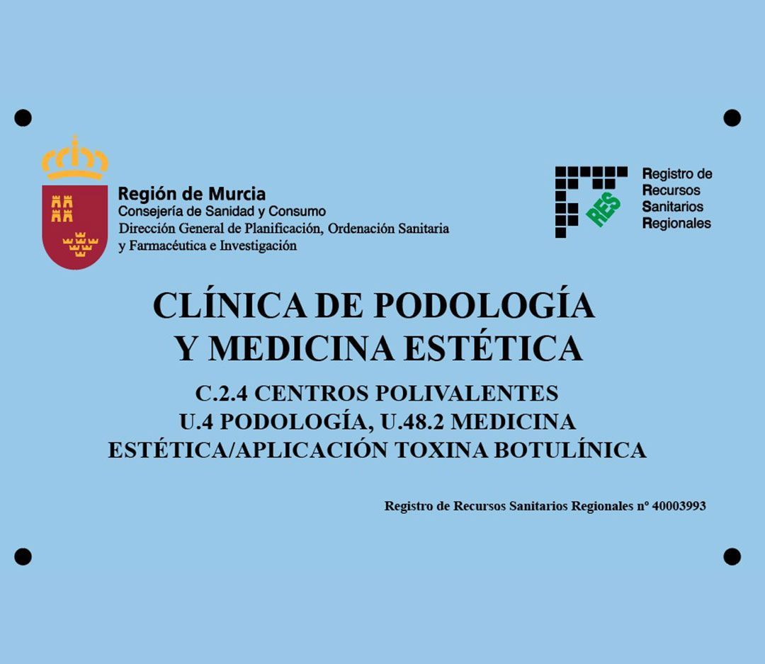 A blue sign that says clinica de podologia y medicina estetica