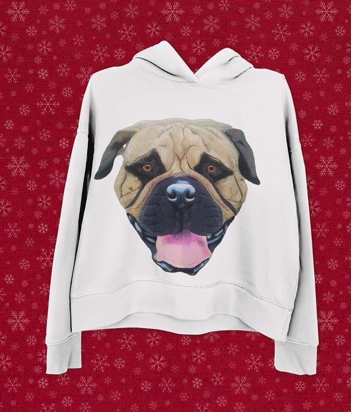 Una sudadera blanca con la imagen de un perro.