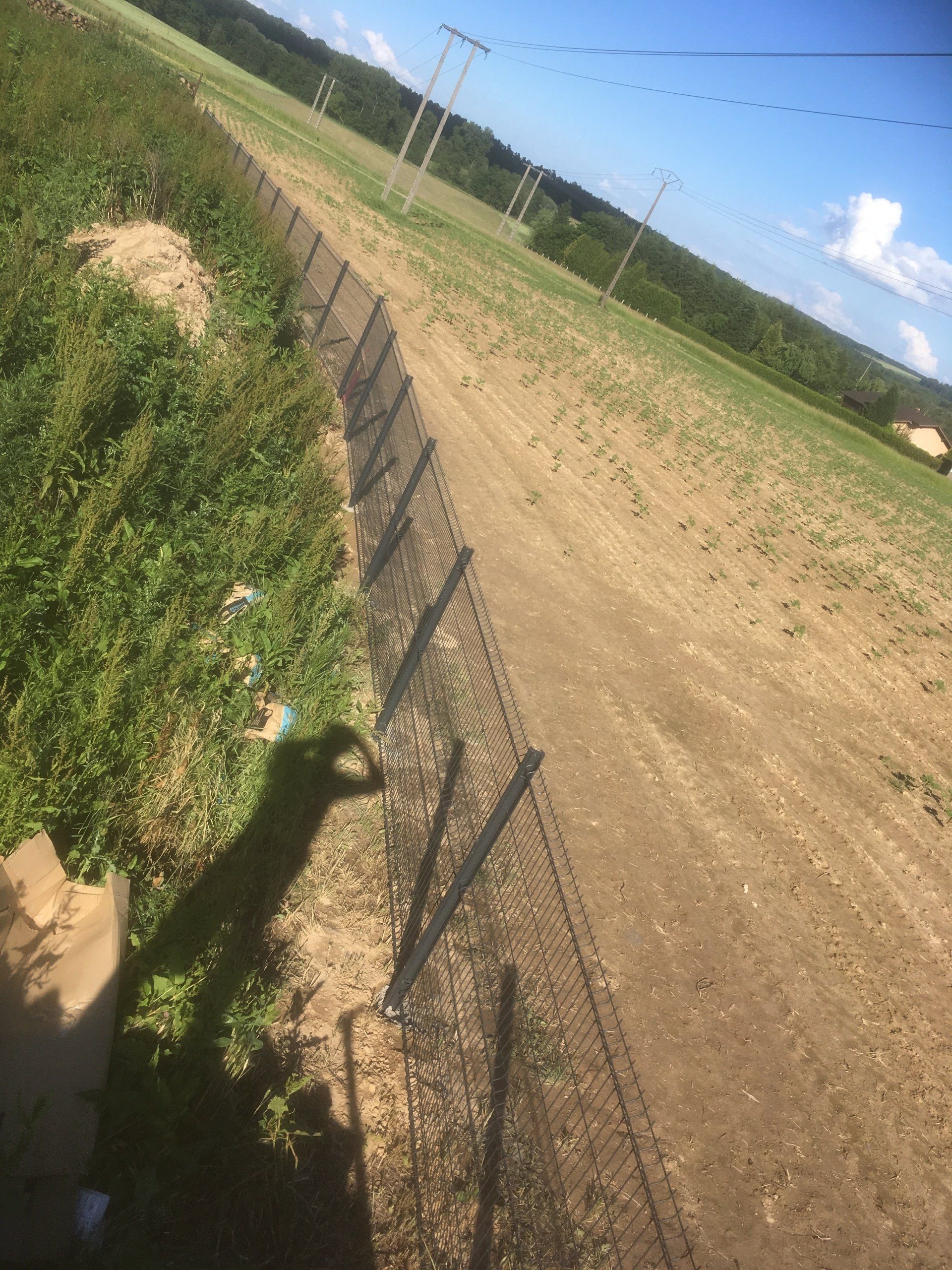 pose de clôture rigide