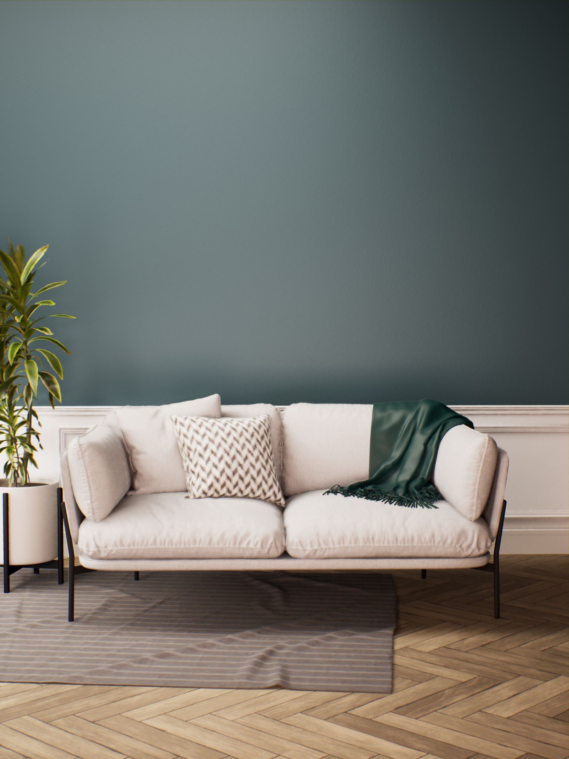 Ein Wohnzimmer mit einem weißen Sofa und einer blauen Wand.