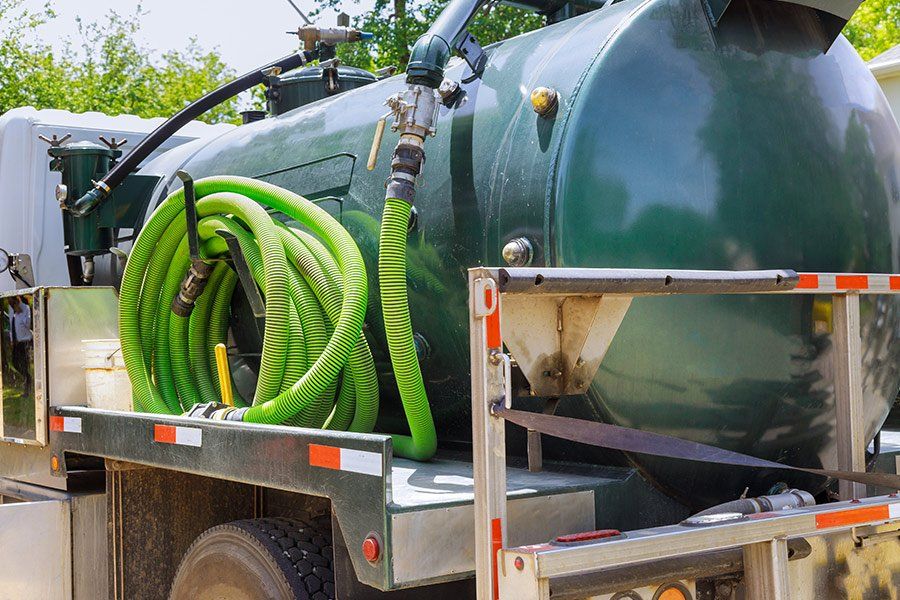 Débouchage de canalisations avec un camion