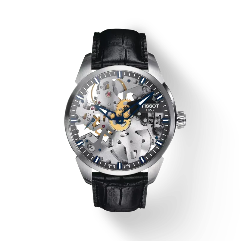 Montre Tissot squelette argentée avec un bracelet en cuir noir.