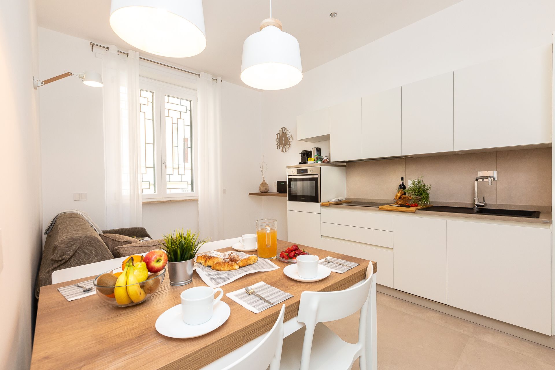 There is a lamp on the nightstand next to the bed.