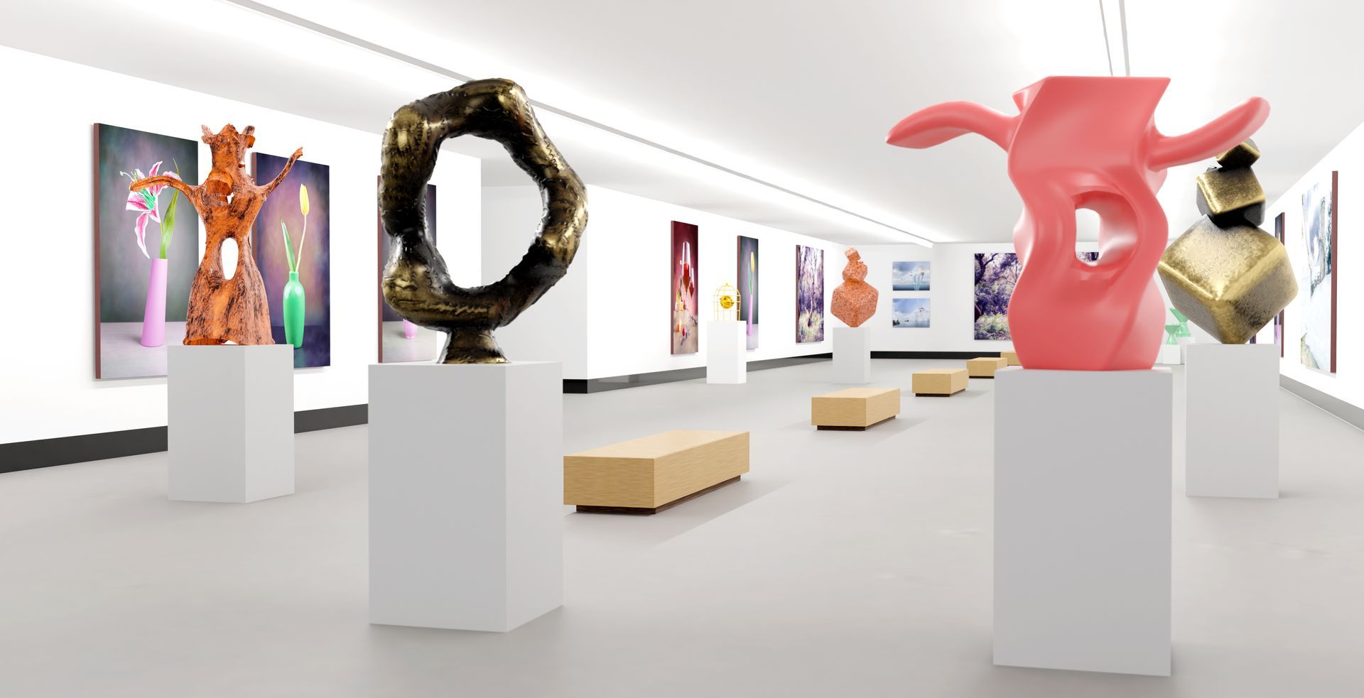 Galerie d'art moderne présentant des sculptures abstraites colorées sur des socles et des bancs blancs.
