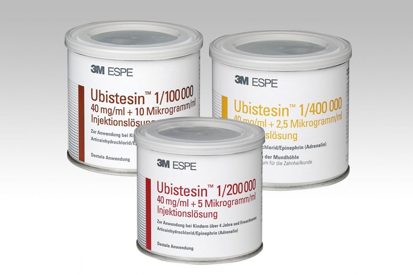 Tre contenitori cilindrici di anestetico 