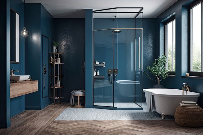 Salle de bains bleu canard avec robinetterie laiton et parquet point de Hongrie