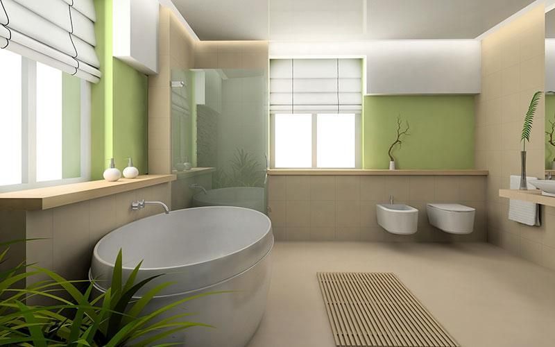 Ein Badezimmer mit Badewanne und zwei Toiletten