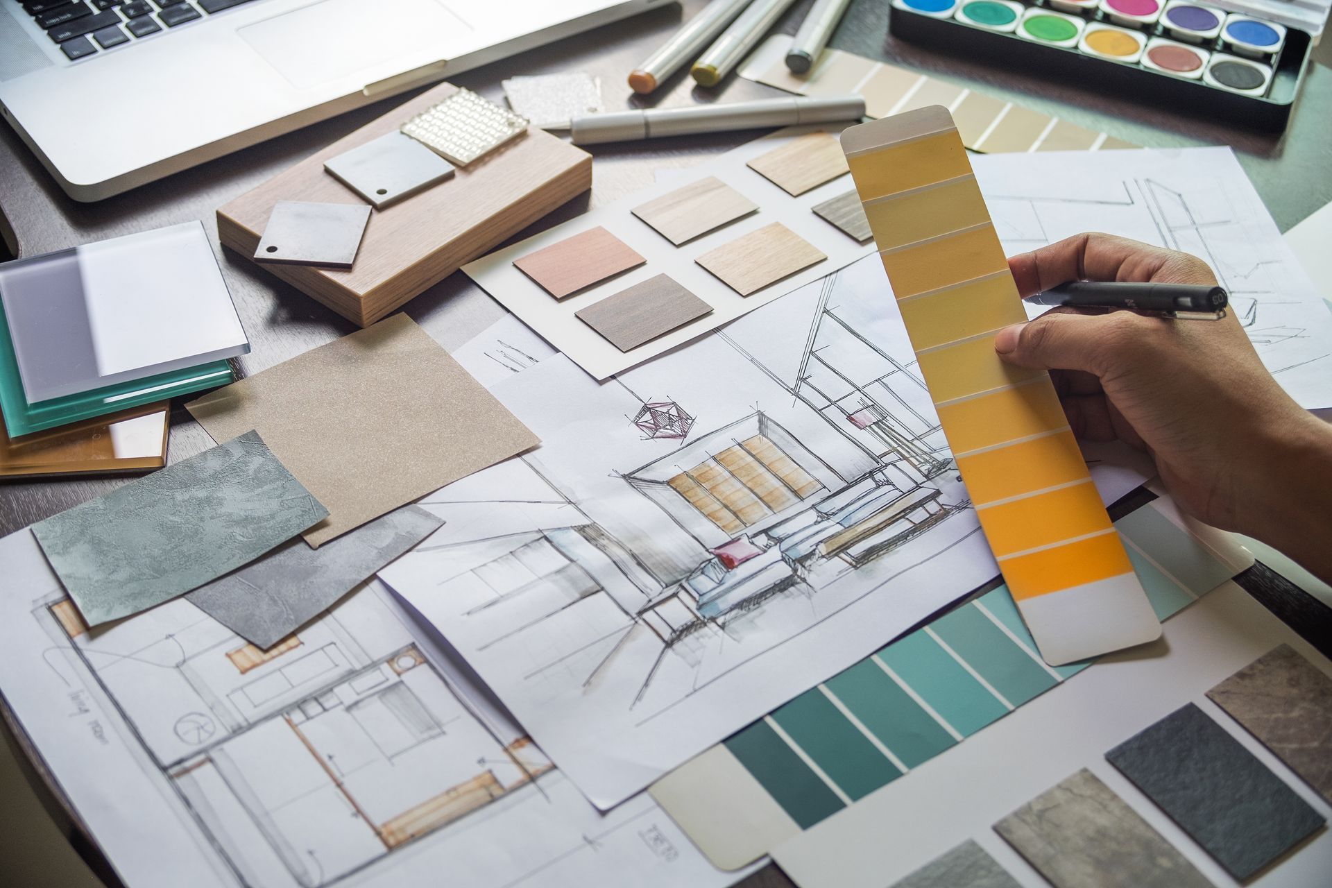 Nuancier de couleurs et de matières avec le plan d'un salon 