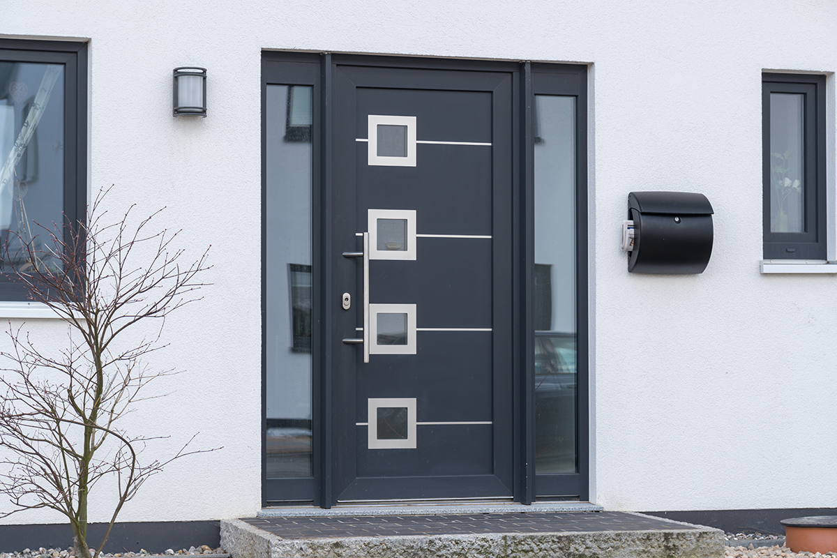 Porte d'entrée en aluminium avec imposte