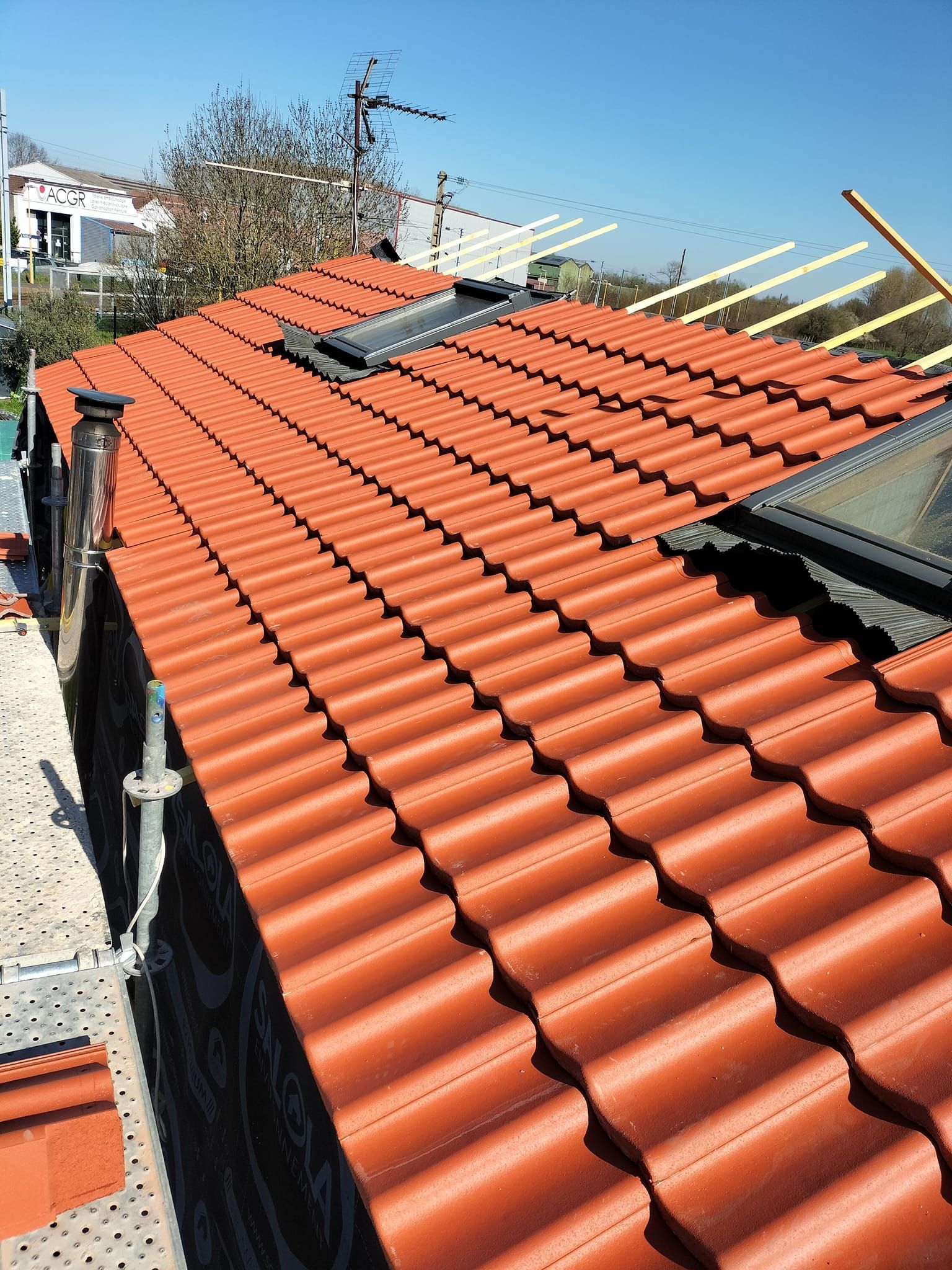 Tuiles et fenêtres de toit