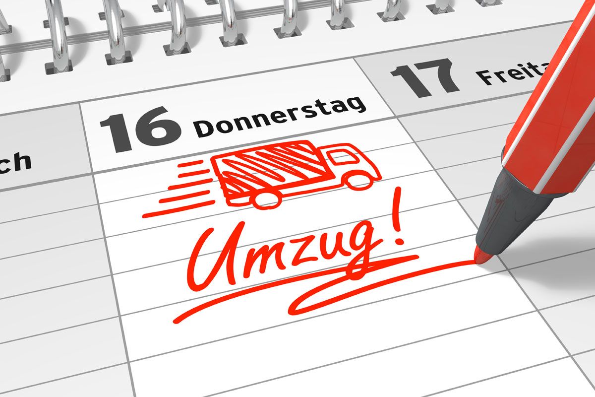 Ein Kalender mit dem Wort „Umzug“ darauf