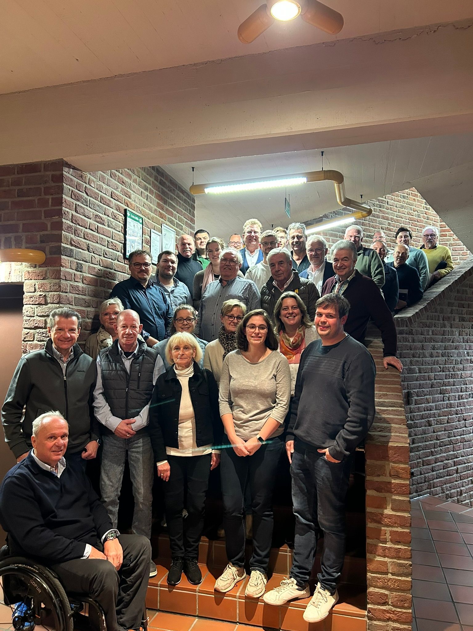 Donuts with frosting, CDU party campaign ad. Text says 