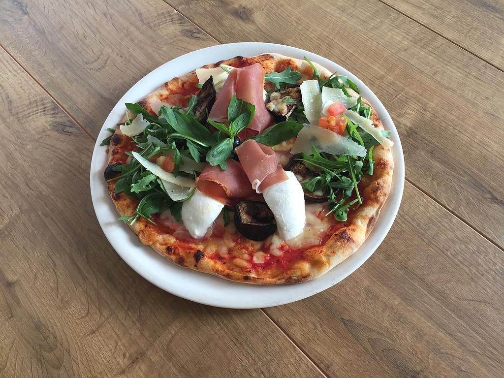 Dégustez nos pizzas italiennes sur place ou à emporter