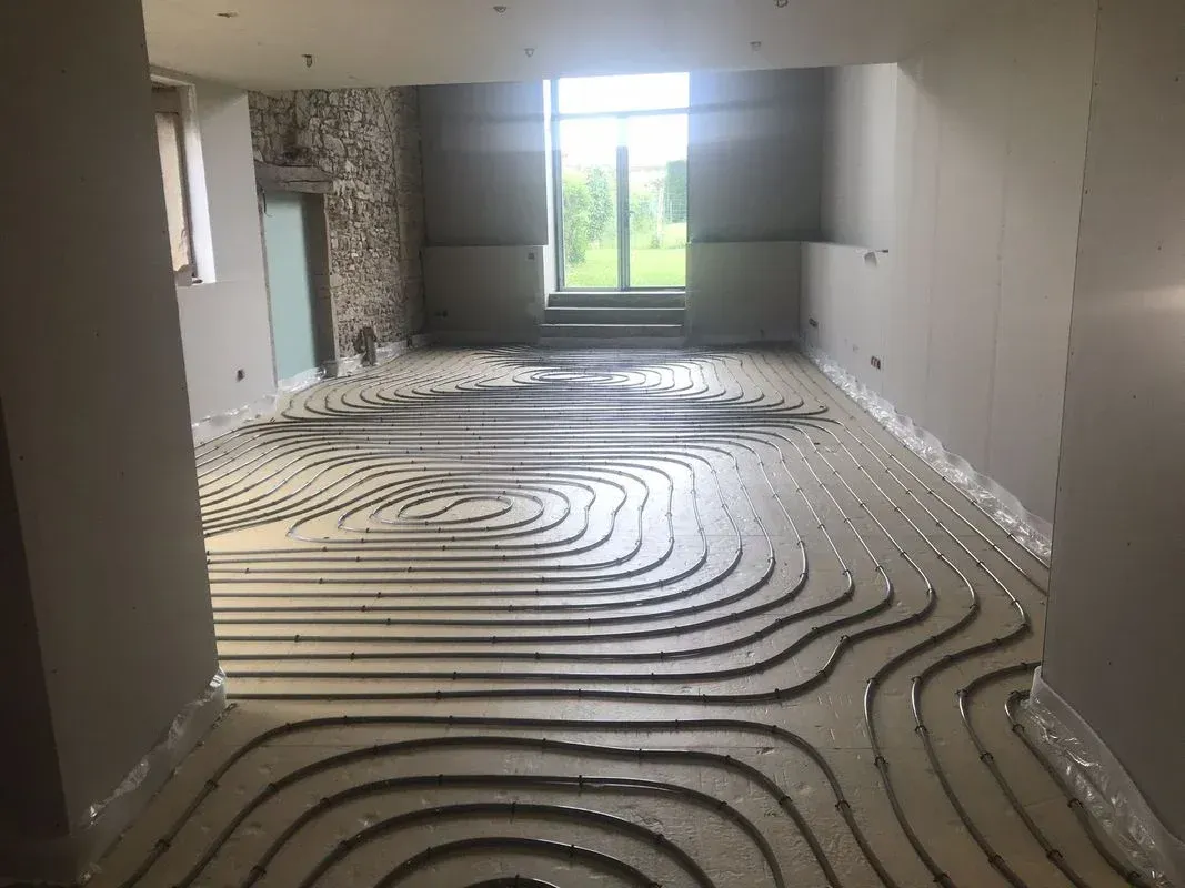 Travaux d'installation de chauffage au sol