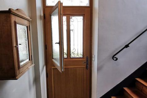 Ouvrant pour nettoyage vitrage sur porte d'entrée