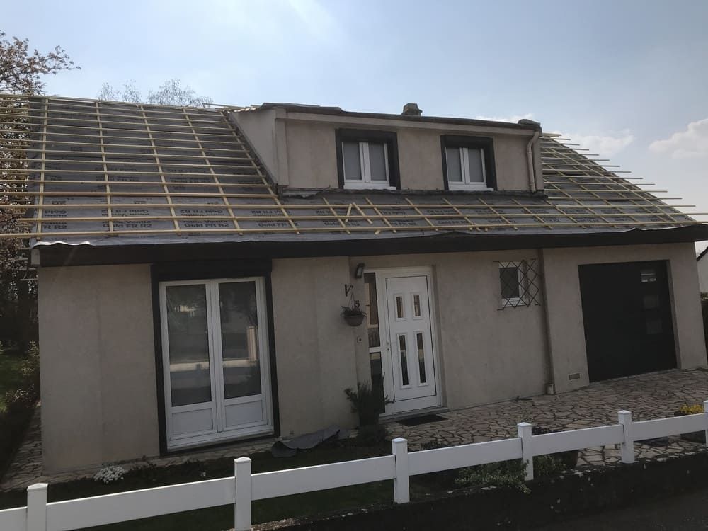 Pose de film sous toiture et contre-litonage