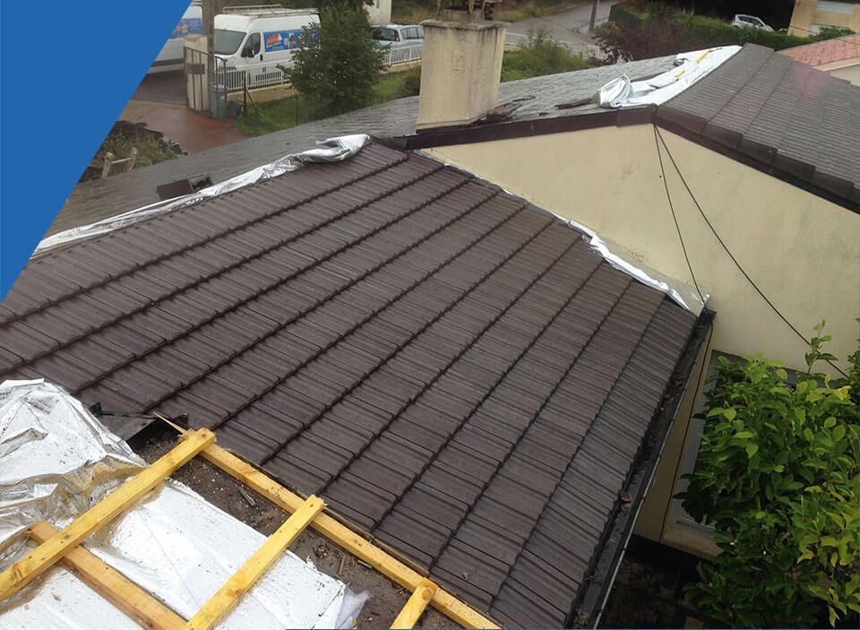 pose de film sous toiture