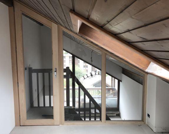 aménagement de comble avec création d'une séparation en bois