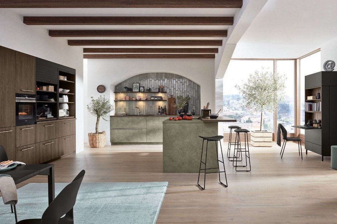 Cuisine ouverte lumineuse couleur vert feuille