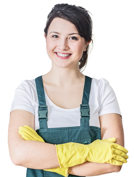 Femme en salopette croisant les bras avec des gants jaunes