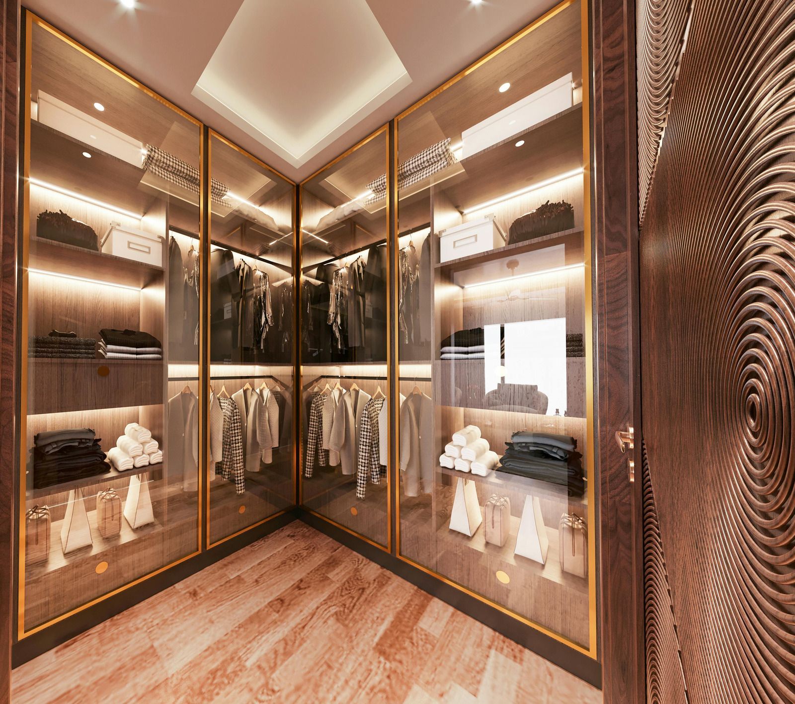 Luxurious walk-in closet with mirrored glass doors, wood floors, and clothing shelves