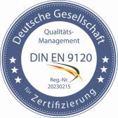 Blue certification seal for Deutsche Gesellschaft für Zertifizierung, “Qualitäts-Management DIN EN 9120” with stars and logo