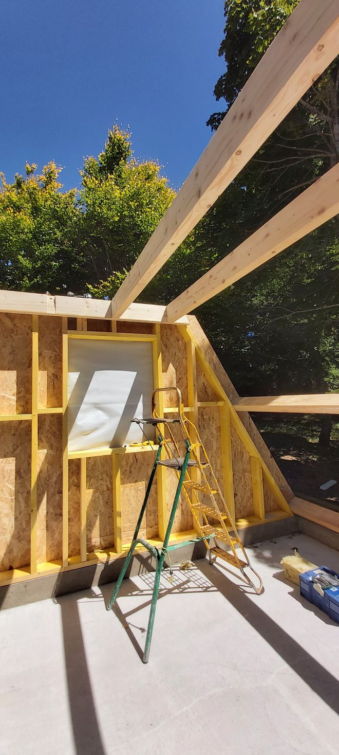 Ossature en bois d'une maison en construction