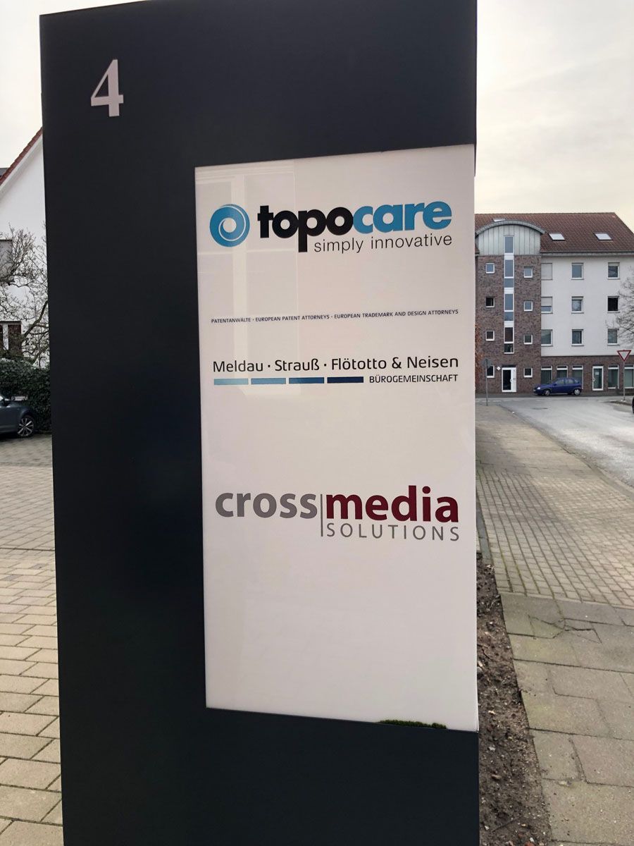 Ein Zeichen für Topocare und Cross-Media-Lösungen