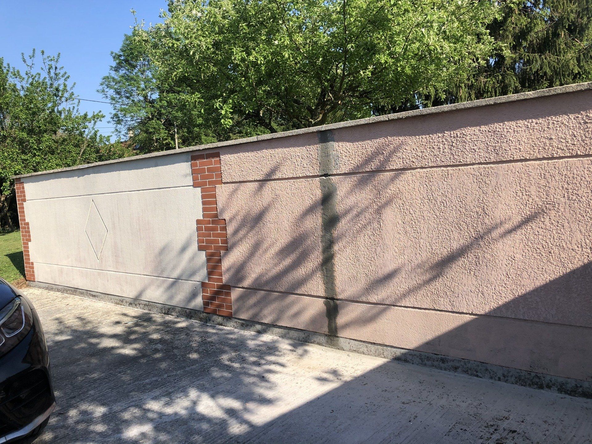 Travaux de finitions : application d'enduits et décoration murs extérieurs