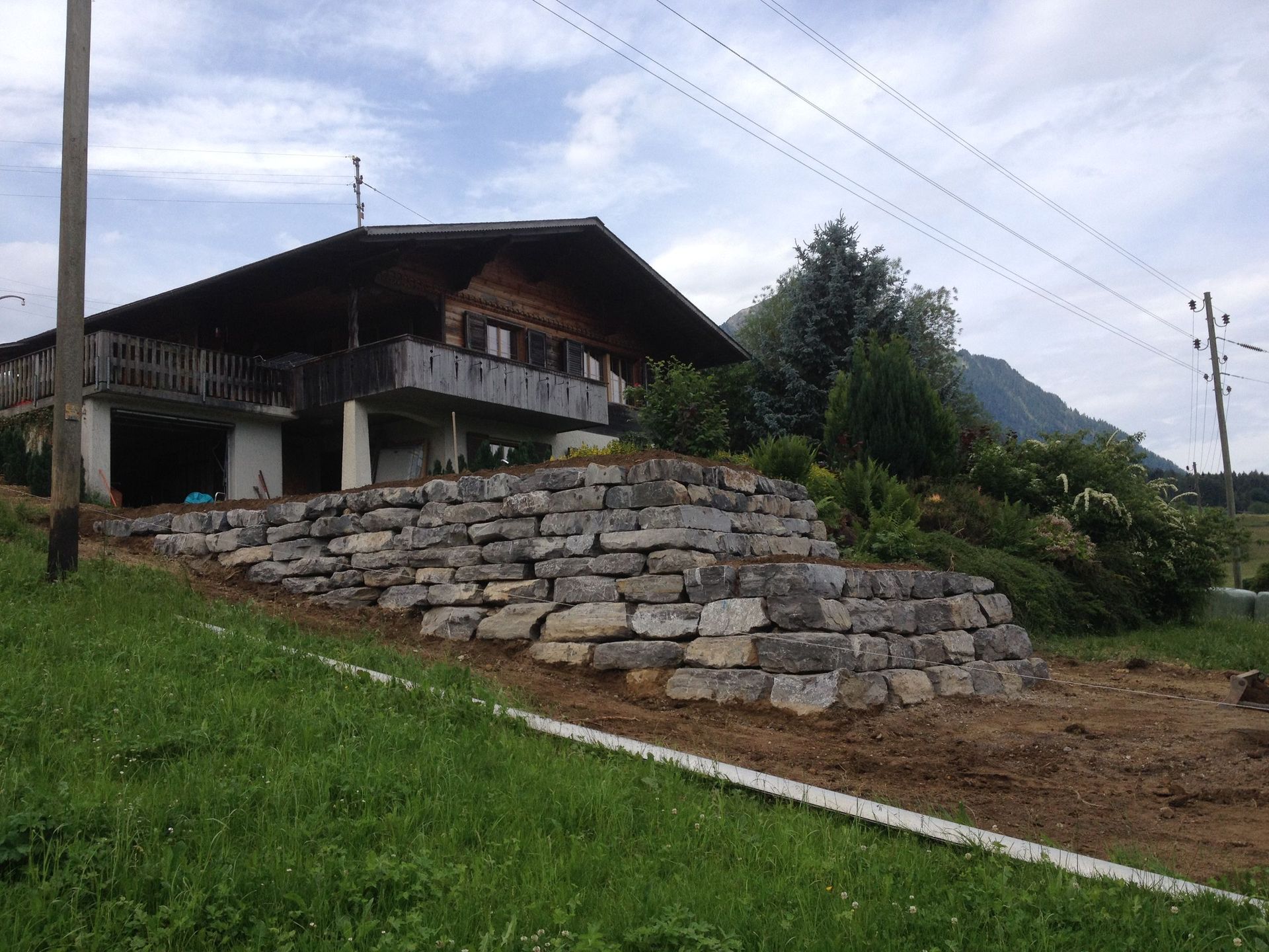 Haus aussen - Schick Holzbau und Umgebungsarbeiten